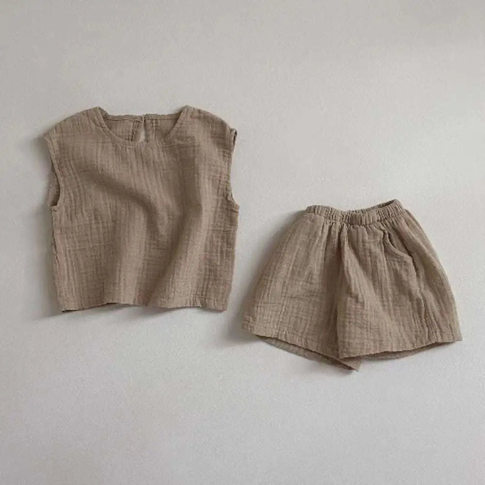 Beige cotton muslin breathable vest shorts set featuring a lightweight sleeveless top and matching shorts