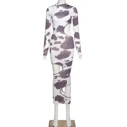 A form-fitting white midi dress with black floral patterns featuring irregular holes in a cow print women style