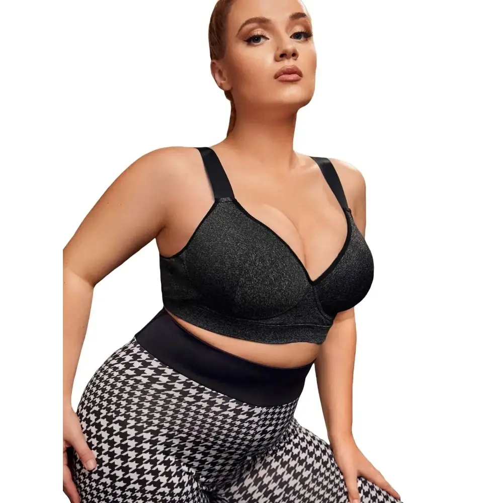 Black textured cozyease womens plus size high impact sports bra with supportive straps and flattering scoop neckline