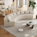 Cream corduroy fabric curved sectional sofa with ribbed texture and elegant curved design for modern living spaces