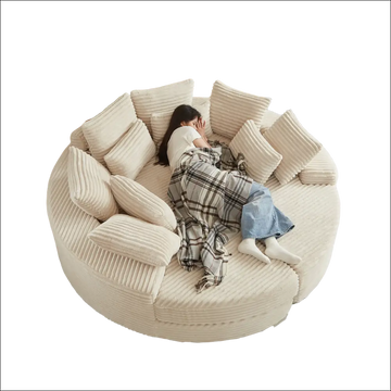 Cream corduroy round recliner sofa with plush ribbed cushions showcasing an ergonomic neck pillow design