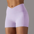Cream high waisted seamless athletic shorts with lavender side pocket design fitness shorts for active use