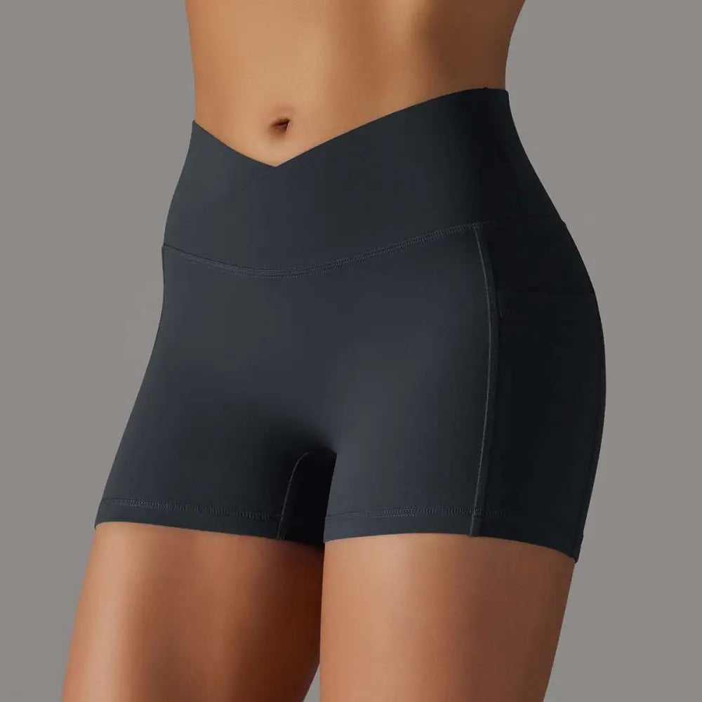 Cream high waisted athletic shorts with ruched back and side pocket design fitness shorts for phone storage