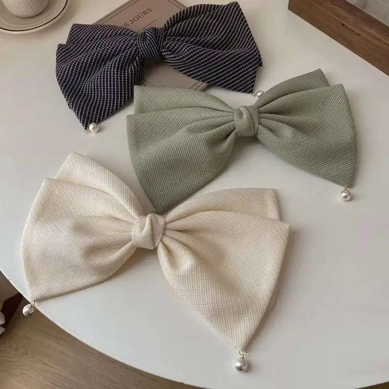 Three elegant bow barrettes spring clip in cream pearl large with navy and sage green textured fabric and pearl accents
