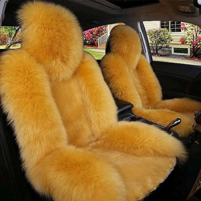 Cream sheepskin winter car cushion in golden fur with plush texture for a soft warm car cushion winter accessory