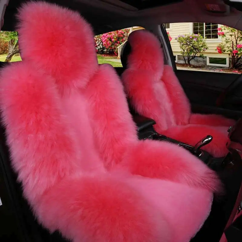 Pink faux fur car seat covers as a cream sheepskin winter car cushion winter accessory for warmth and comfort