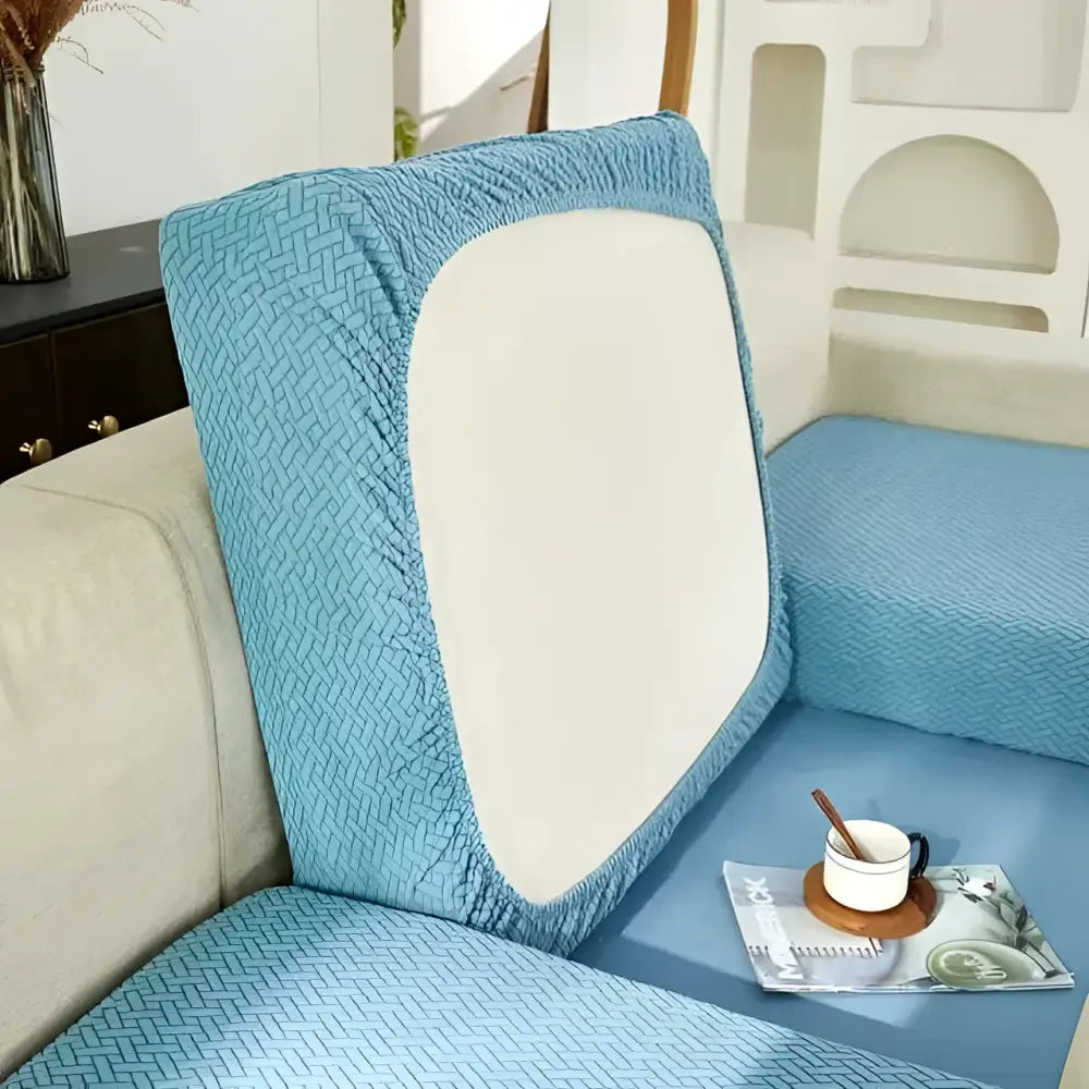 Blue textured fabric sofa cover with white central panel for cream stretchy universal sofa cover use