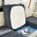 Gray herringbone sofa cushion cover with white panel paired with cream stretchy universal sofa cover texture