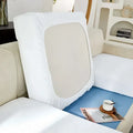 Cream stretchy universal sofa cover with white stretchy fabric and beige inner panel for universal sofa protection