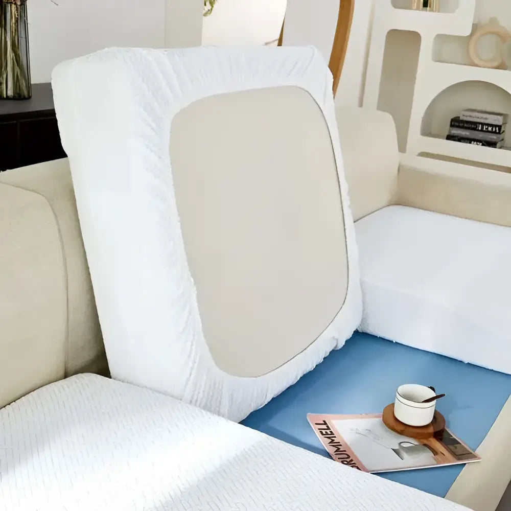 Cream stretchy universal sofa cover with texture featuring a white fabric cushion cover with beige inner panel