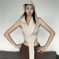 Cream stylish short crop hooded wraparound top in cream with sleeveless design and side cutouts for a modern look