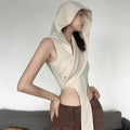 Cream stylish short crop hooded wraparound top featuring a cream sleeveless design with a draped asymmetrical front