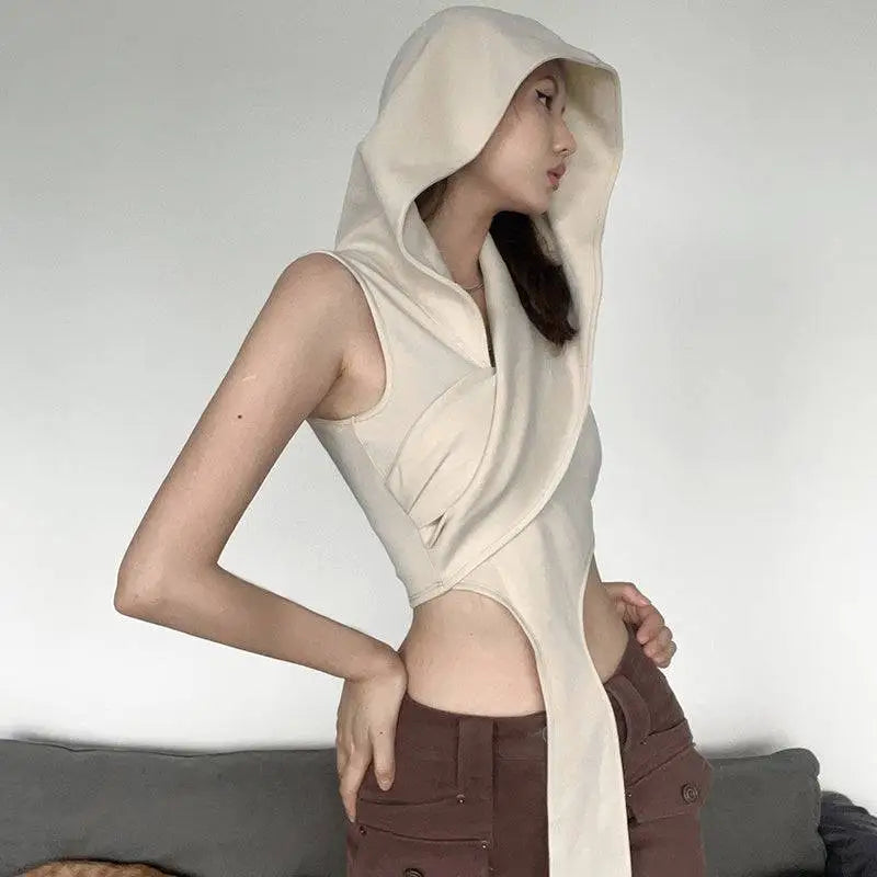 Cream stylish short crop hooded wraparound top featuring a cream sleeveless design with a draped asymmetrical front