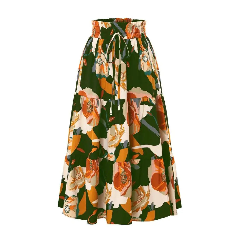 Cream tiered pleated floral elastic waist skirt featuring bold orange and mustard blossoms on flowing fabric