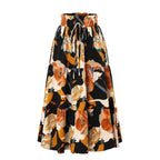 Cream tiered pleated floral elastic waist skirt with bold black orange and cream floral pattern and drawstring waistband