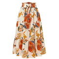 Cream tiered pleated floral elastic waist skirt featuring a vibrant orange rust and cream floral pattern on light fabric