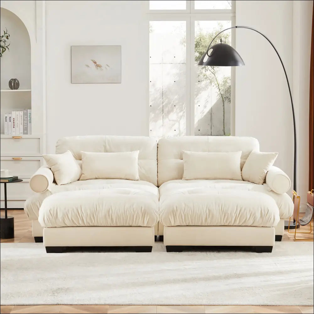 Cream velvet size modern sofa with round bolster armrests featuring plush cream-colored fabric and matching cushions