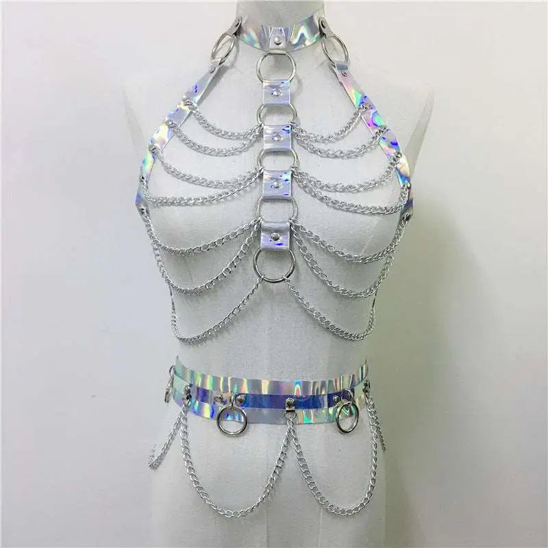 Creative versatile laser ladies belt bodysuit featuring an iridescent holographic chain harness with silver metal rings and chains