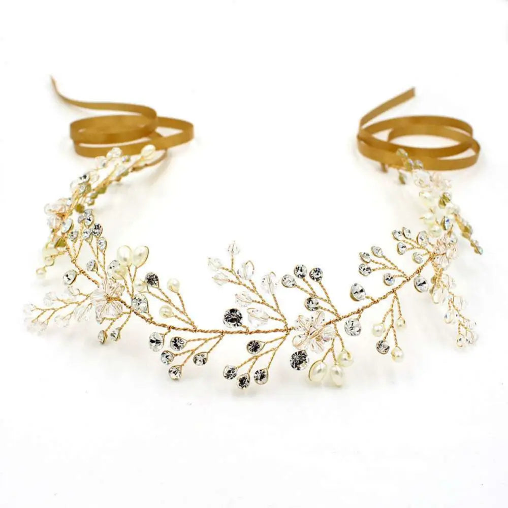 Elegant gold-toned crystal styling pearl headwear with clear crystals, pearl-like beads, and delicate floral designs for weddings