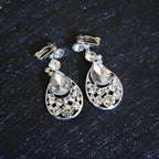 Silver teardrop clip-on earrings with clear crystals and openwork design from crystal bridal headdress flowers set