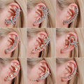 A collection of silver and gold rhinestone ear cuffs featuring crystal butterfly flower and intricate floral starfish designs