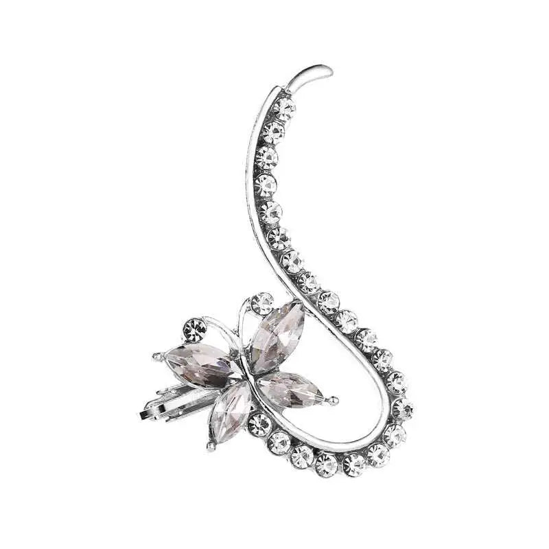 Silver-toned rhinestone ear cuff featuring a delicate crystal butterfly flower design for elegant single wear
