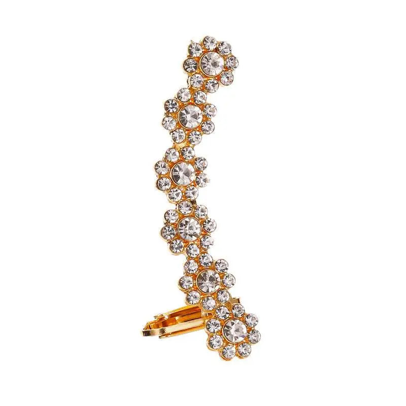 Gold-toned crystal butterfly flower rhinestone ear cuff with clear sparkling stones arranged in a floral pattern