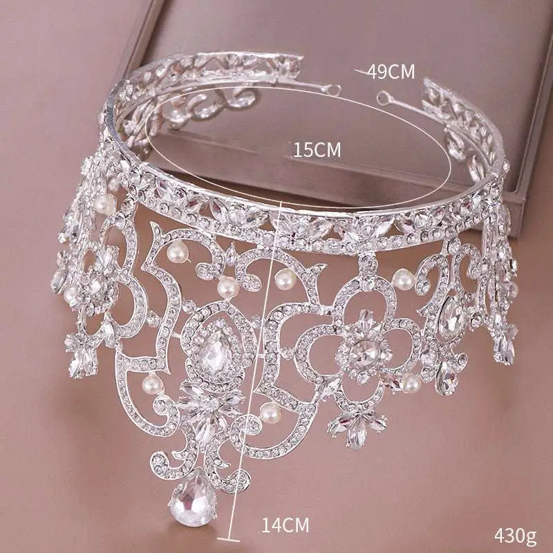 Silver ornate crystal crown catwalk tiara adorned with sparkling silver crystals and dangling pearls