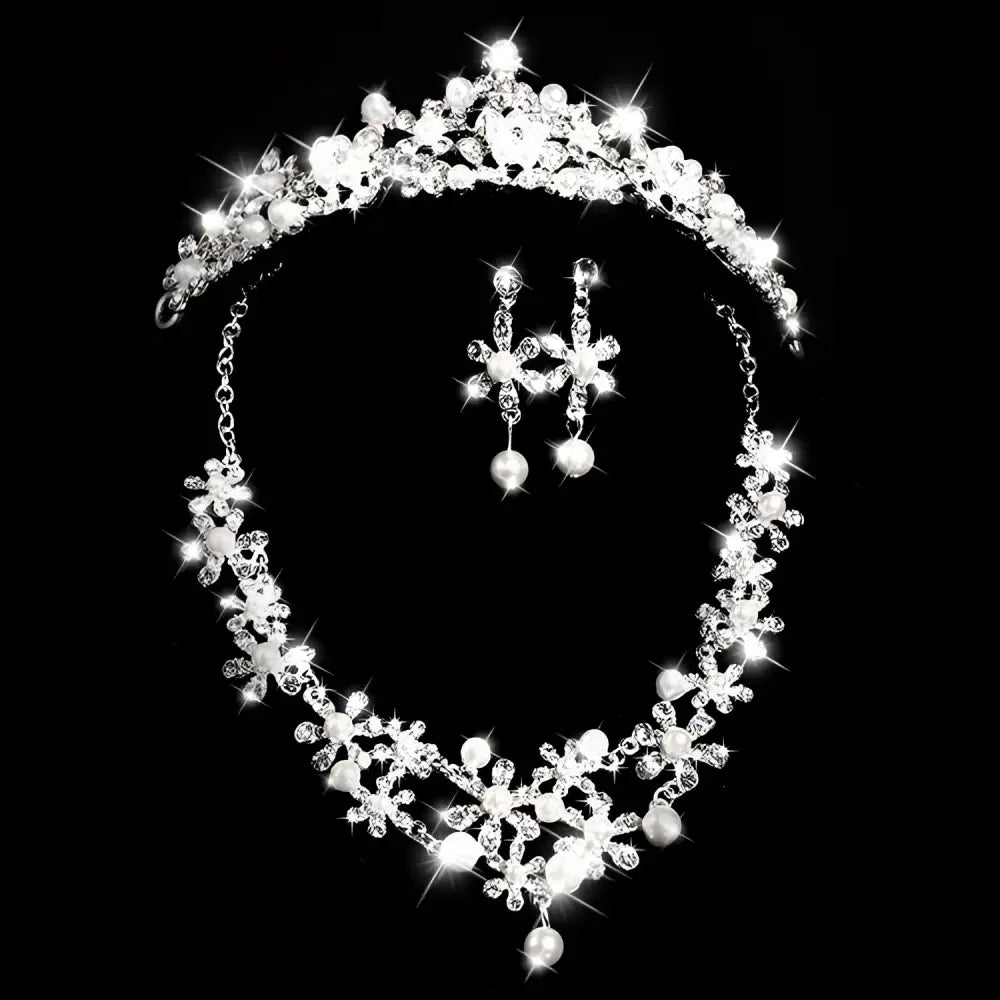 Sparkling silver tiara with clear crystals and white pearls paired with matching crystal flower necklace earrings