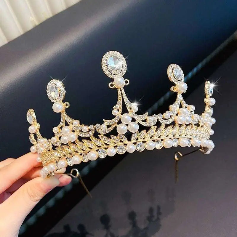 Gold-colored crystal pearl girls princess crown headdress adorned with clear crystals and rows of white pearls