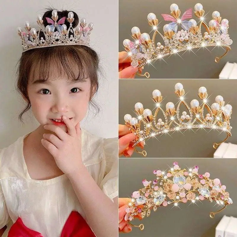 A sparkling gold girls princess crown headdress adorned with crystals pearls and delicate pink butterfly accents