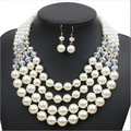 Crystal pearl long necklace and earrings set featuring creamy white pearls and clear crystal beads in a multi-strand design