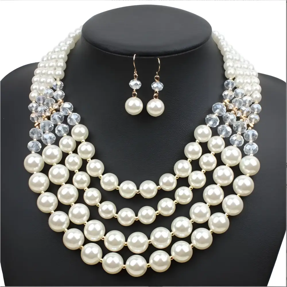 Crystal pearl long necklace and earrings set featuring creamy white pearls and clear crystal beads in a multi-strand design