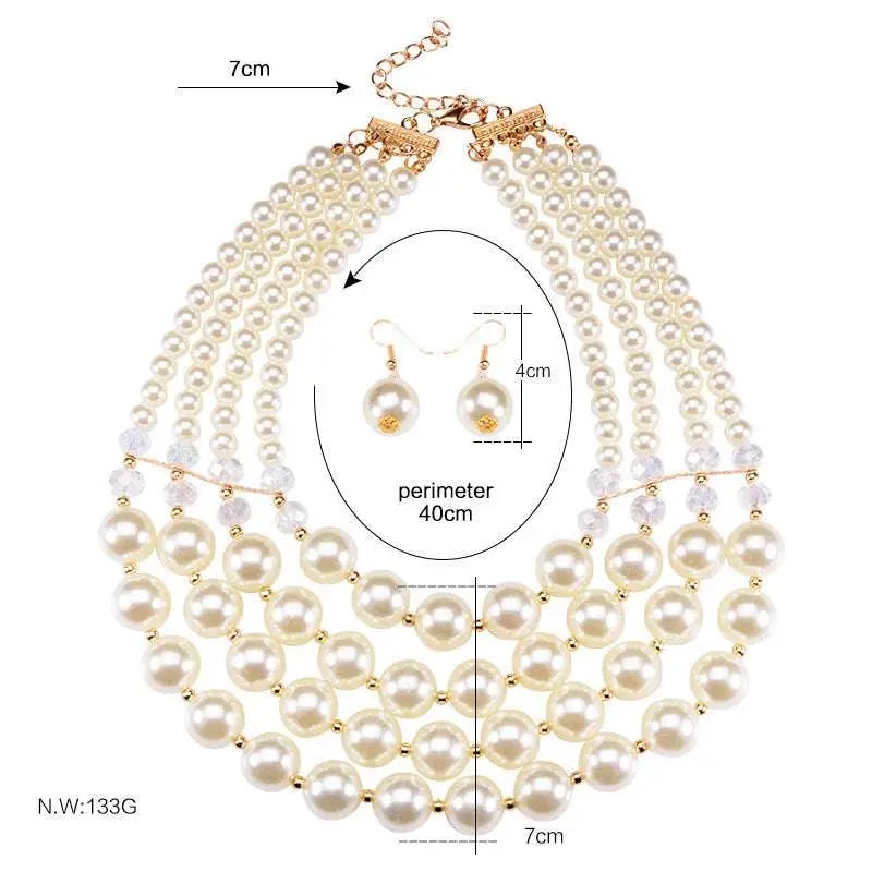 Cream-colored crystal pearl long necklace and matching earrings with gold-toned clasp in multi-strand design