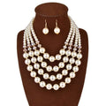 Crystal pearl long necklace and earrings set with multi-strand white pearls and gold-toned accents with crystal beads