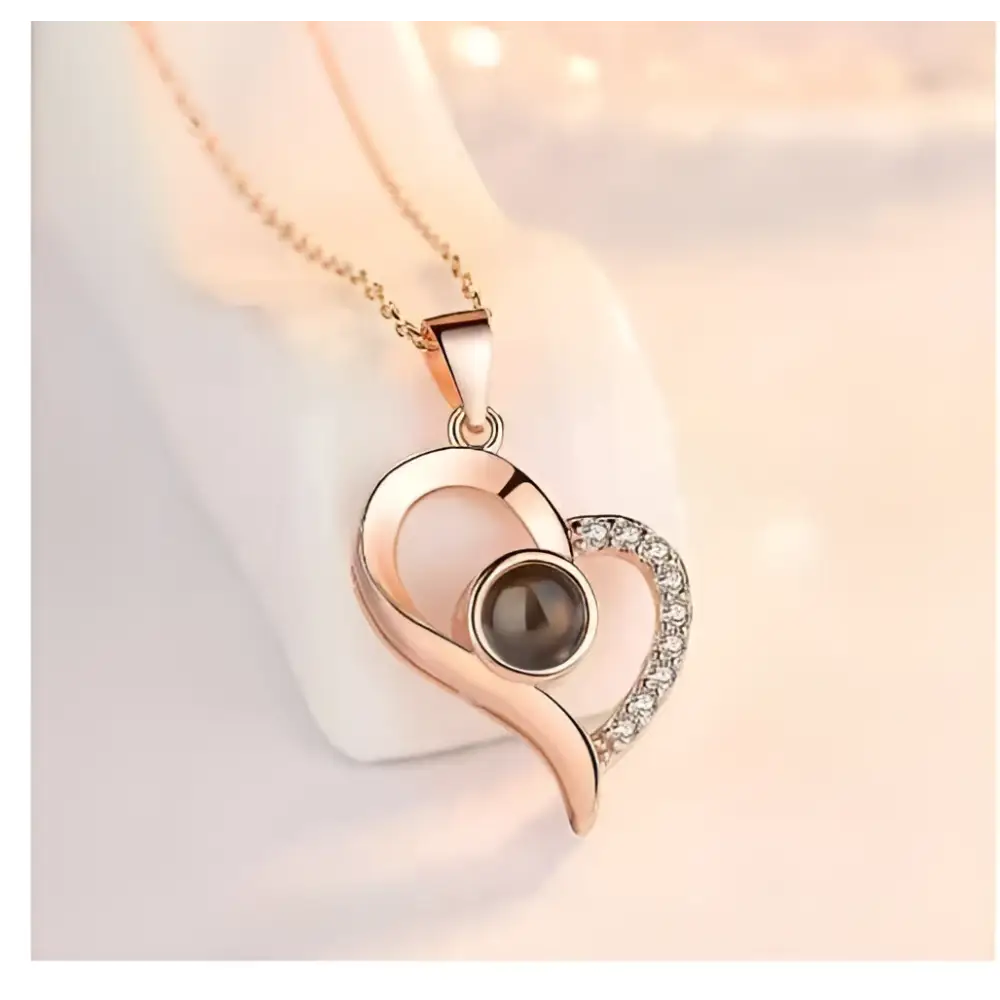 Rose gold crystal pendant necklace with dark round gemstone and elegant gift box symbolizing everlasting love