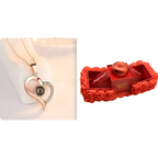 Rose gold heart crystal pendant necklace with sparkling diamonds and dark gemstones in an elegant gift box for everlasting love