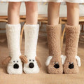 Cute cartoon dog floor socks in white and beige with soft fabric and detailed embroidered nose designed for comfort