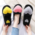 Set of three black plush home cute love slippers with fuzzy heart shape and winter warm plush pom-poms