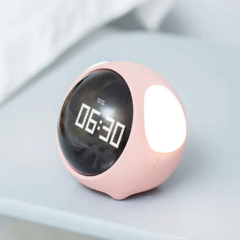 Cute pixel expression digital electronic cute pink spherical alarm clock with black display showing 06:30 and white illuminated panel