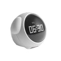 White rounded digital electronic cute alarm clock with black display showing 06:30 from cute pixel expression series