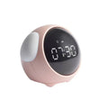 Pastel pink cute pixel expression digital electronic alarm clock with rounded design and black display showing 07:30