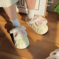 Cream-colored bunny-themed cute rabbit shoes with pink ears and embroidered face for winter fuzzy slippers use
