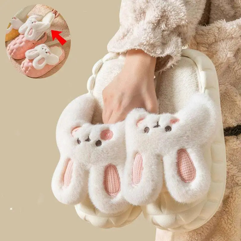 Cute rabbit shoes winter fuzzy slippers are white fluffy bunny shaped with pink inner ears and embroidered facial features