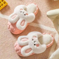 Cute rabbit shoes pink bunny slippers with fluffy white faux fur ears and embroidered face for winter fuzzy slippers use