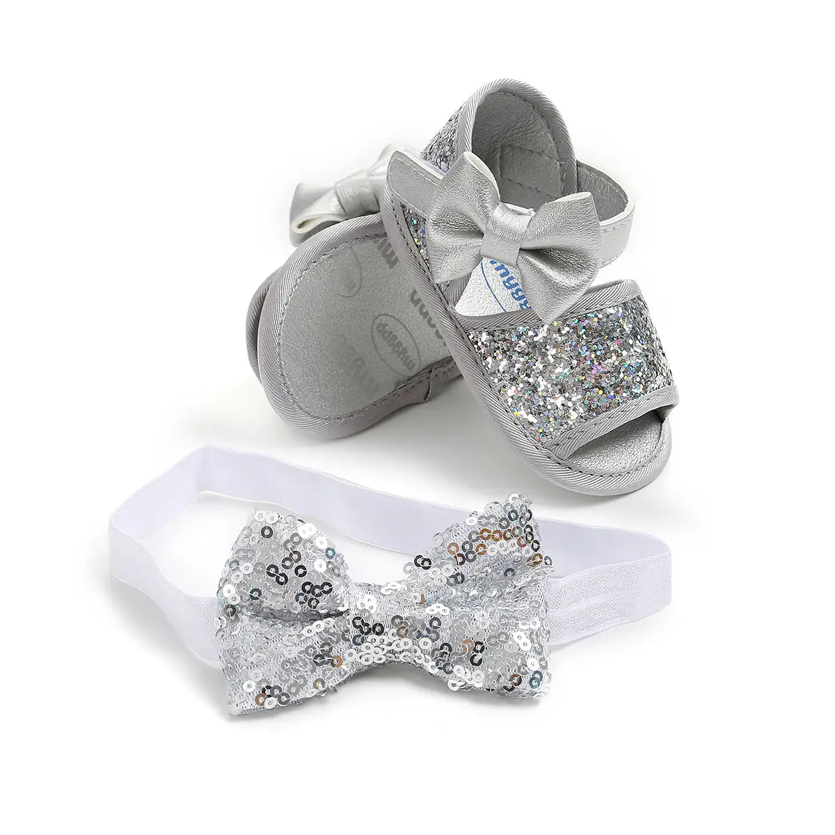 silver sequined baby shoes princess sandals with a matching bow and white elastic headband designed for a princess look