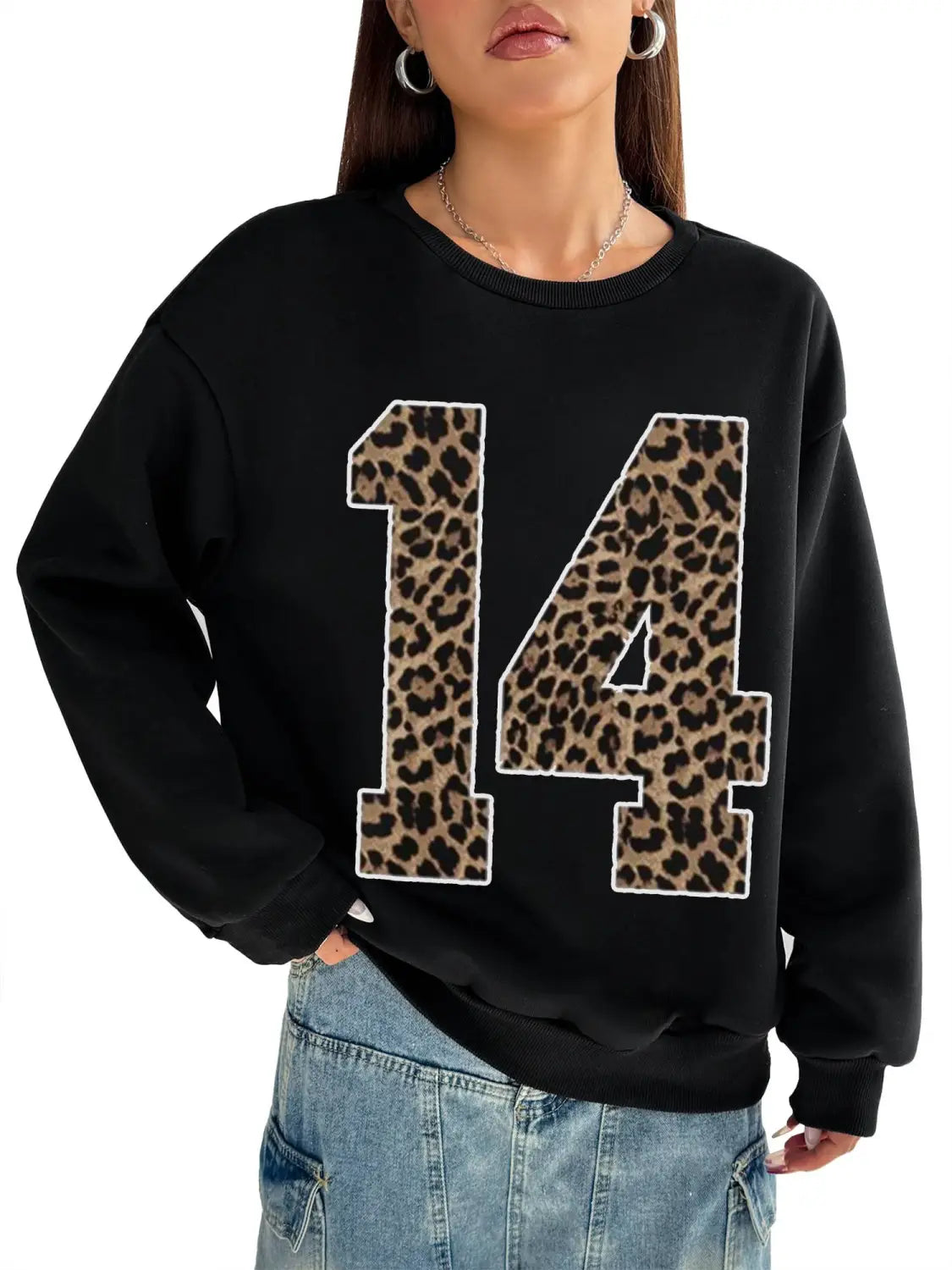 Black crew neck sweatshirt featuring a bold leopard-print number 14 with white trim on the front.
