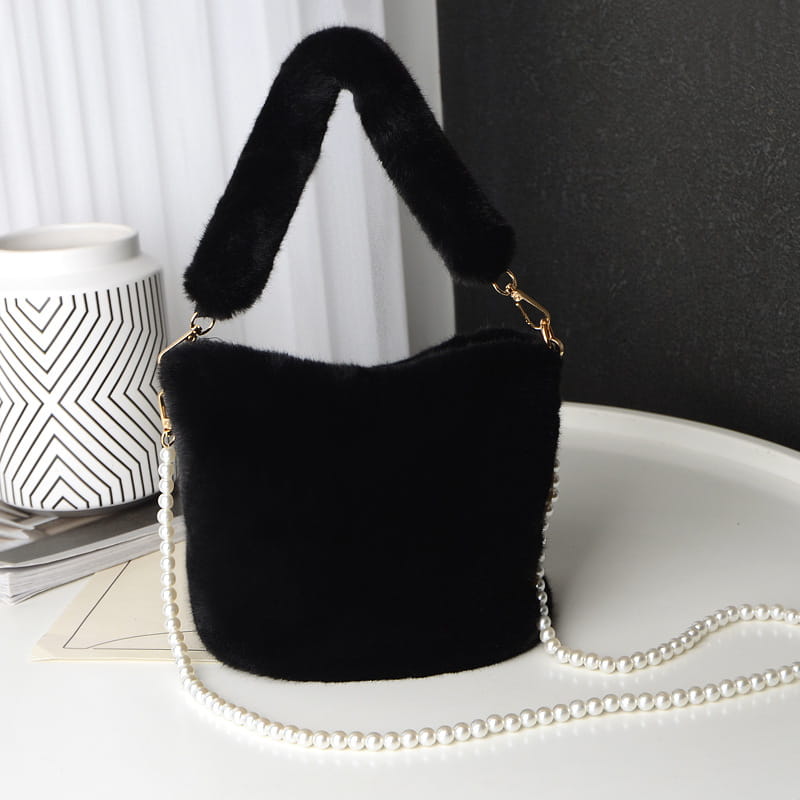 black faux fur plush bucket bag with pearl chain design strap and matching fuzzy handle in a yellow checkerboard plush bucket style