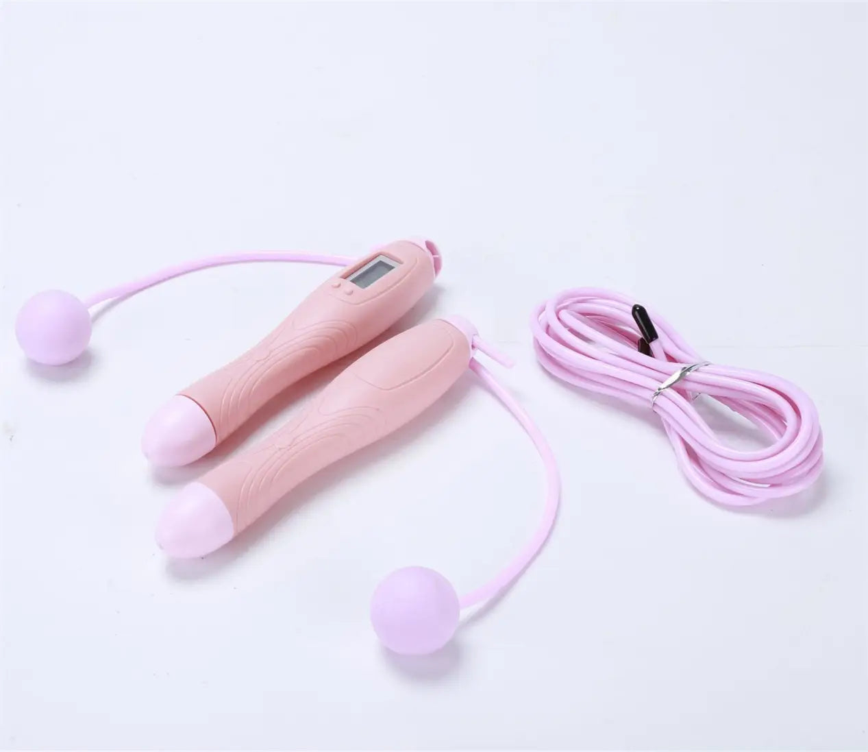Black cordless electronic skipping rope with pink digital jump rope, textured handles, and soft lavender spherical ends.
