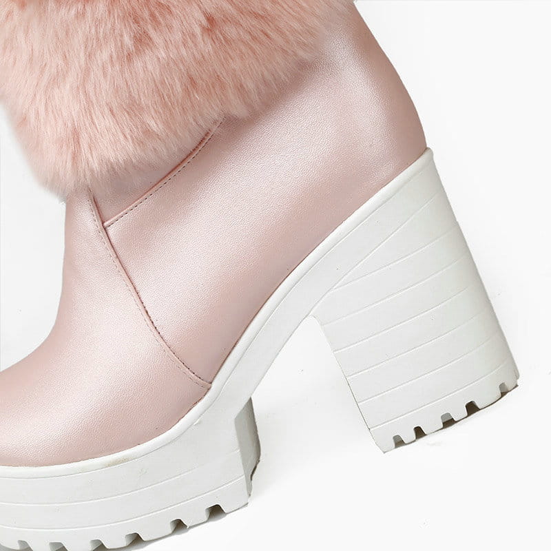 pink faux leather sweet bow boots with a fluffy pink faux fur cuff and a white chunky platform heel designed as heel snow sweet winter footwear